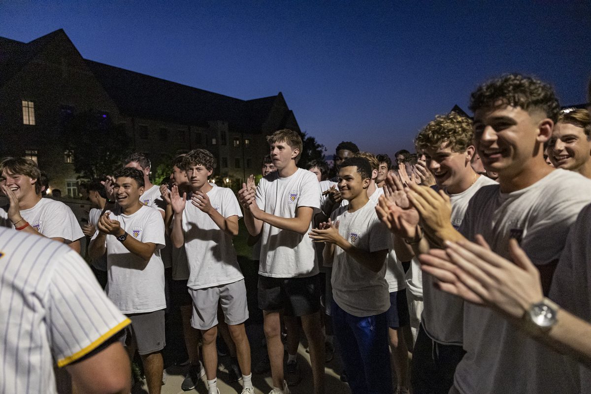 Royals cheering together on the quad